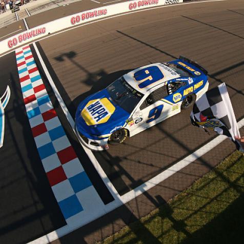 WATKINS GLEN, NEW YORK - AUGUST 04: Chase Elliott, driver of the #9 NAPA AUTO PARTS Chevrolet, takes the checkered flag to win the Monster Energy NASCAR Cup Series Go Bowling at The Glen at Watkins Glen International on August 04, 2019 in Watkins Glen, New York. (Photo by Sean Gardner/Getty Images)