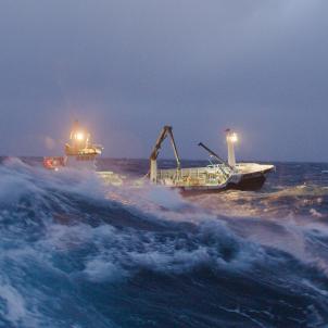 The Lady Alaska in growing weather, with ice on its rails.