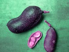 Jatoba fruit on gray background, view from the top.