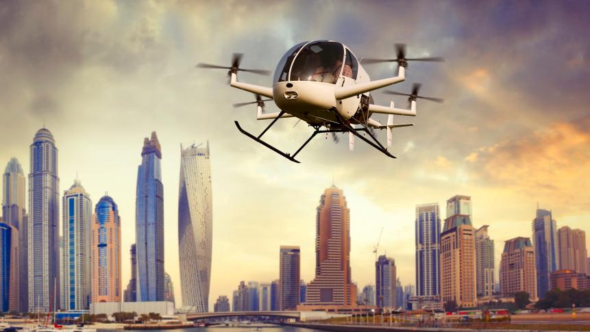 870422894 Flying futuristic drone transporting people in Dubai